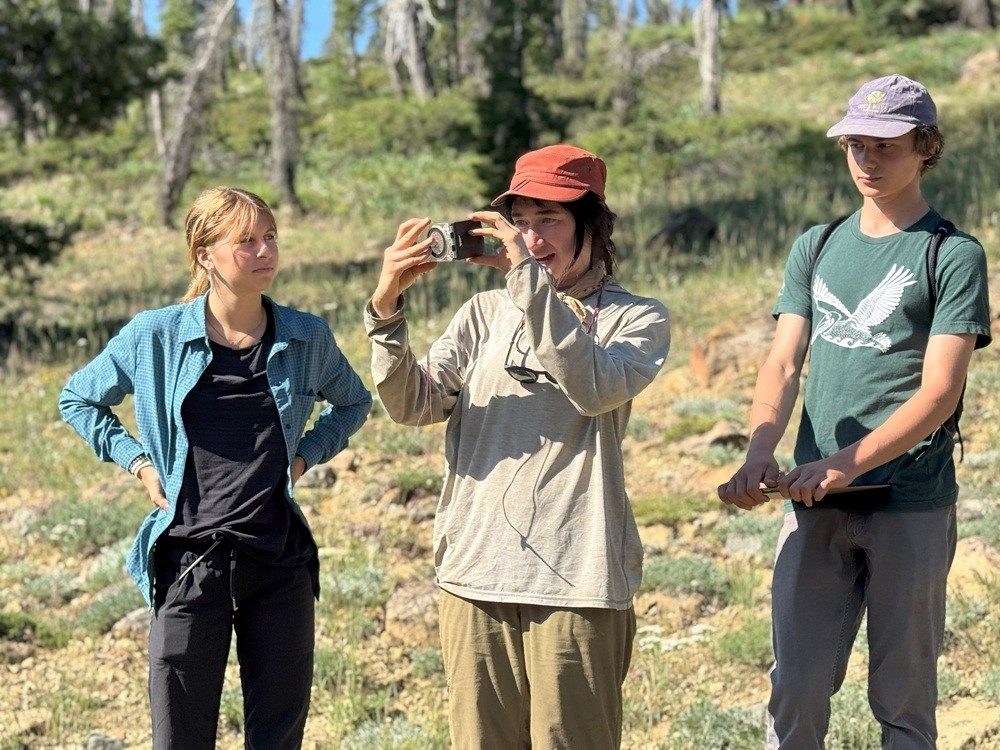 Cal Poly Humboldt grad student Jenni Hedin teaching measurements by rangefinder.
